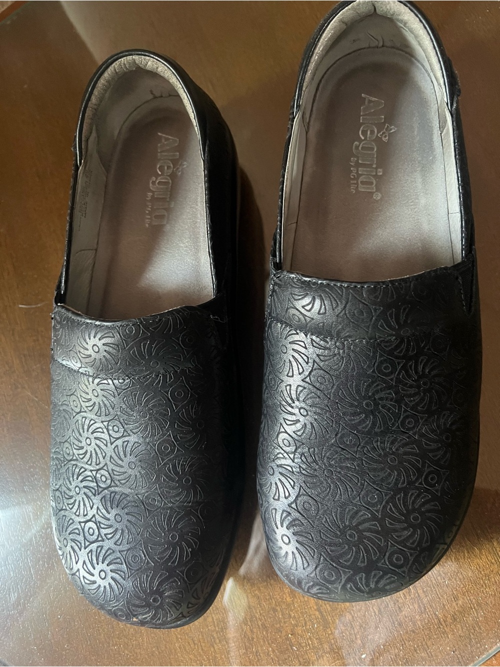 Alegria Black Embossed Slip-Ons